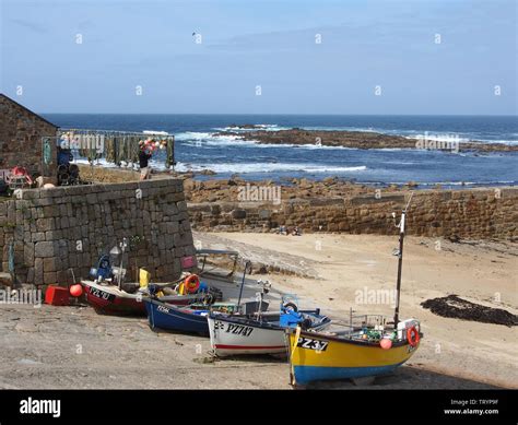 Colourful Fishing Boats Hauled Up On To The Quay At Sennen Cove