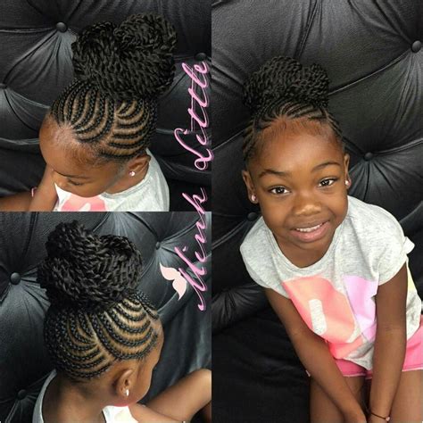 These cute braids really make the hairstyle a cool one. The weave is a bit much for a child this young, but I like ...