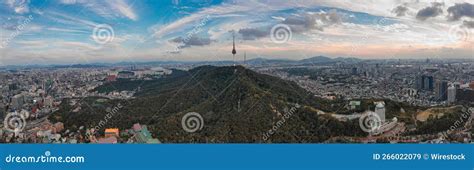 Panoramic Shot Of The N Seoul Tower On A Hill During The Sunrise In