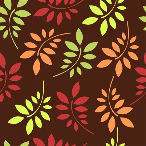 A Brown Background With Green And Red Leaves