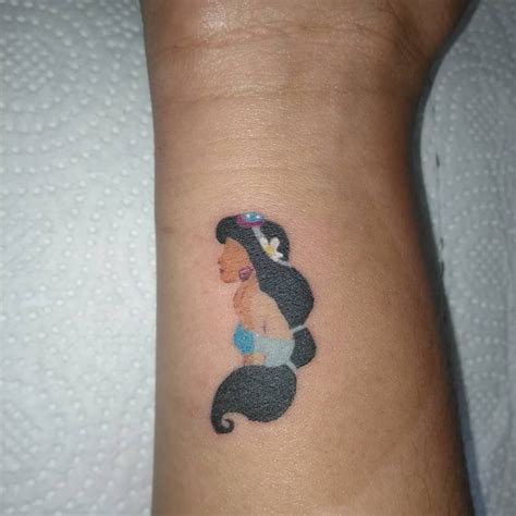 These 130 Disney Princess Tattoos Are The Fairest Of Them All Princess Tattoo Jasmine Tattoo