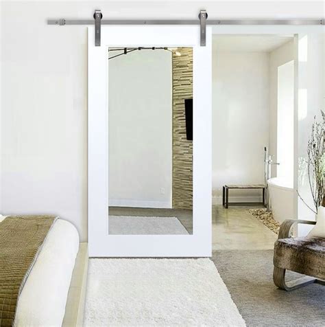 These types of doors are easily identifiable, thanks to the use of reclaimed wood and heavy hardware. White Primed Mirror Sliding Barn Door with Hardware Kit ...