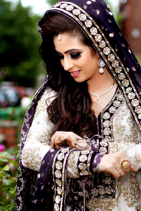 Asian Bride On Her Valima Day In Purple Dress And Traditional Makeup