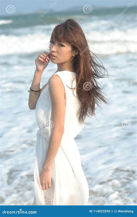 Beautiful Asian Girl Playing On The Beach Stock Image Image Of Dress