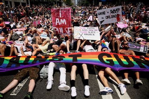 pride marches on with jubilation and solemn tributes to victims of massacre the new york times