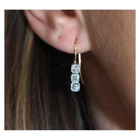 Diamond Drop Earrings Set In Platinum And 18ct Yellow Gold