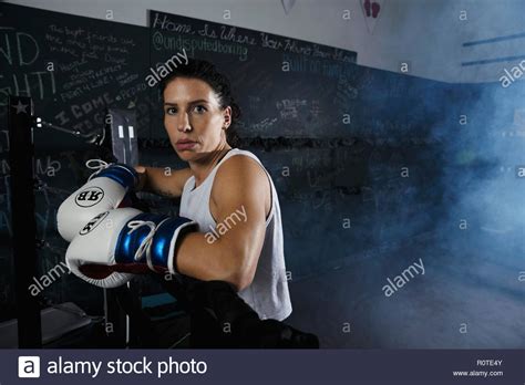 Portrait Tough Female Boxer Standing In Boxing Ring Stock Photo Alamy