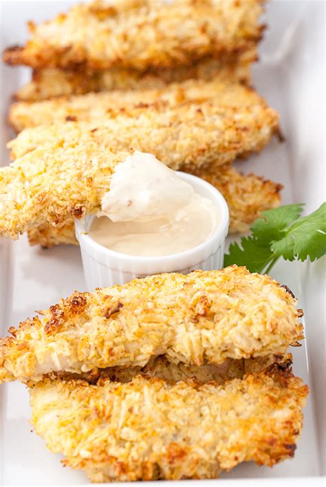 Parmesan crusted chicken is guaranteed to be a new family favorite chicken recipe! SOUR CREAM AND ONION CRUSTED CHICKEN TENDERS | Taste of Yummy