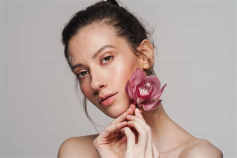 Sensual Half Naked Woman Posing With Orchid On Camera Stock Photo By