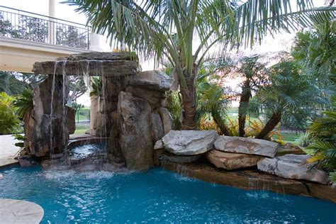 Lagoon Pool And Spa Underneath Grotto Waterfall By Lucas Lagoons Inc