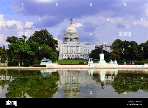 Congress Building In Capitol Hill Washington Dc With Stormy Sky And Water Reflections Stock
