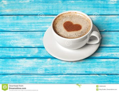 Coffee With Heart Shaped Foam On Wooden Background Stock Photo Image