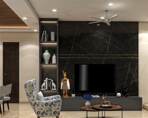 Spacious Tv Unit Design With Black Marble Wall Panel Livspace