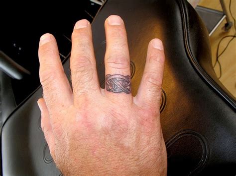 Https://tommynaija.com/tattoo/celtic Finger Tattoo Designs