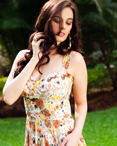 This is an oasis like no other! White Corset Top Over Blue Demim, Evelyn Sharma Looks Amazingly Fabulous - StarBiz.com
