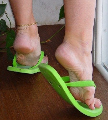 Pin On Women Feet Showing Soles In Sandals