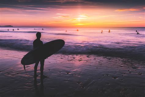 Download Surfer At Sunset Royalty Free Stock Photo And Image