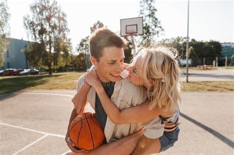 happy couple having fun on basketball playground stock image image of vacation romantic