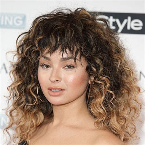 How To Style Curly Bangs Without Looking Like A Flashdance