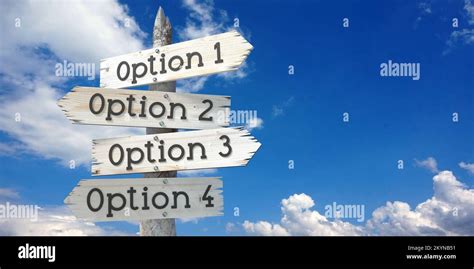 Options 1 2 3 4 Wooden Signpost With Four Arrows Stock Photo Alamy