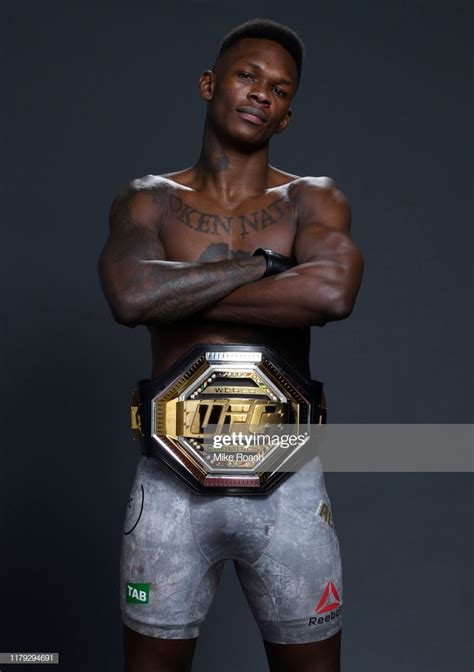 Israel Adesanya Of Nigeria Poses For A Portrait Backstage After