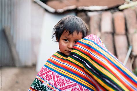 Peruvian Indigenous Baby Looking At Camera By Stocksy Contributor