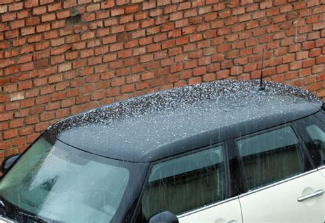 Hail Falling Over Car Roof Hailstones Can Damage The Bodywork Stock