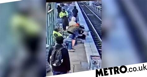 Watch Woman Pushes Three Year Old Girl Face First Onto Train Tracks In Horror Attack Metro