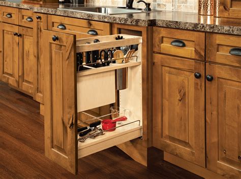 Kitchen cabinets can be really cluttered. Base Pantry Pull-out Utensil Storage - Cardell Cabinetry