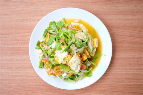 Spicy Salad With Fried Eggs Yam Kai Dao Serve On White Dish Set On