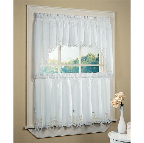 Etched glass preserves privacy but doesn't obscure your window. White Bathroom Window Curtains | A Creative Mom