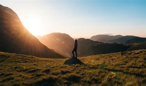 Free Photo Silhouette Photography Of Person Standing On Green Grass In