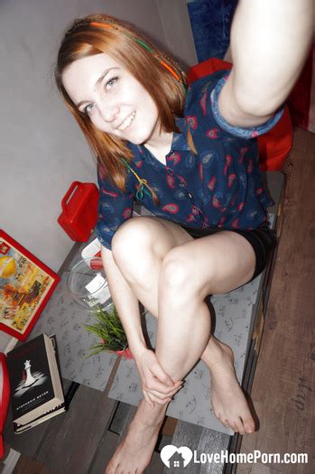 Cute Redhead In Socks Shows Off Her Body