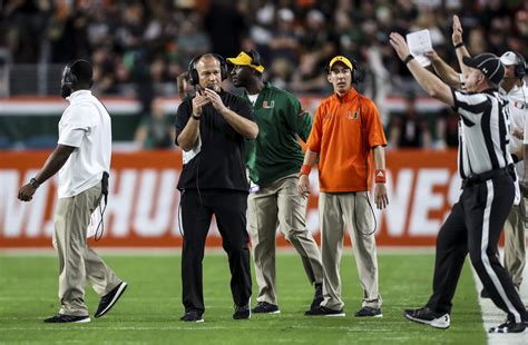 MONICA HERNDON | Times Miami Hurricanes head coach Mark Richt calls a