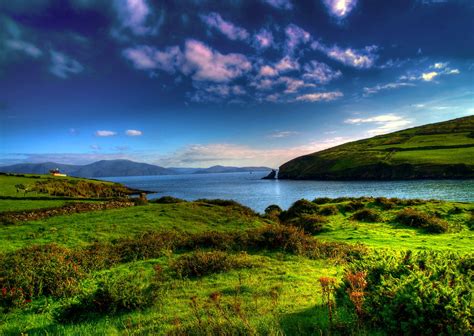 Online Crop Landscape Photography Of Green Grass Field Near Body Of