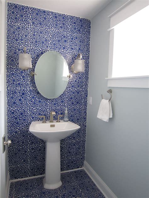 Powder Room With Blue Ceramic Pebble Tiles On Floor And Up Lavatory