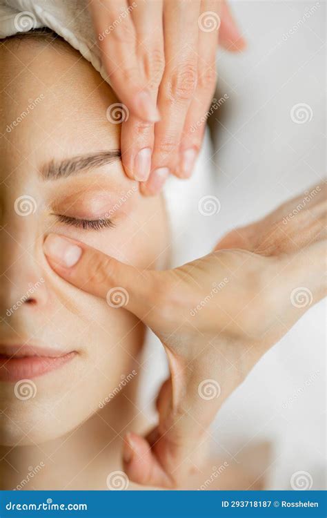 Beautician Makes A Face Massage For A Woman Stock Image Image Of Hands Hand 293718187