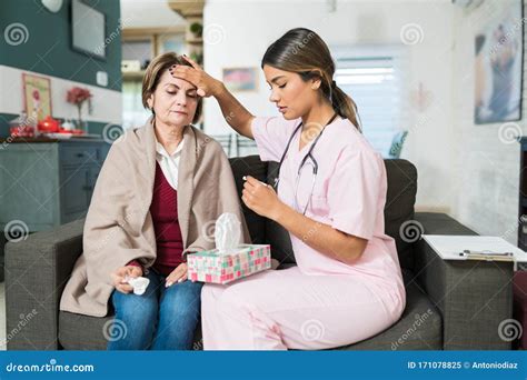 caregiver taking care of sick patient at home stock image image of nursing senior 171078825