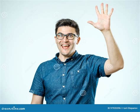 Young Man Making High Five Gesture Stock Photo Image Of Attractive