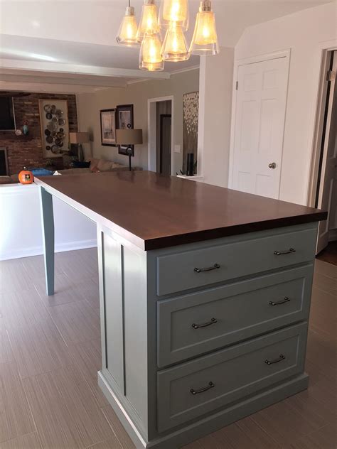 Kitchen Island With Seating And Tapered Legs Kitchen Island Cabinets