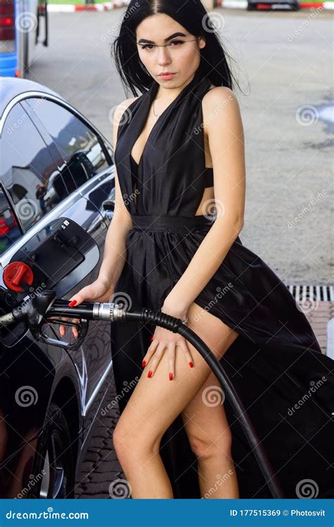 Because Someone Has To Do It Girl Fill Car With Gasoline Gas Filling Sensual Woman At Gas