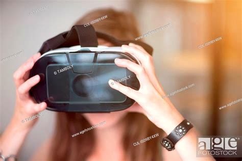 Woman Using Virtual Reality Headset Stock Photo Picture And Royalty