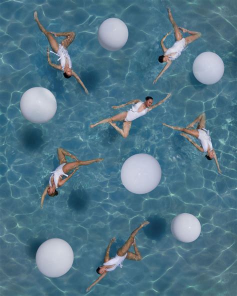 Photographs Of Synchronised Swimmers From Above Show Perfect Poise And