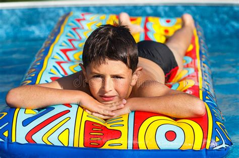 Boy Getting Out Of Swimming Pool Stock Photo Image Of