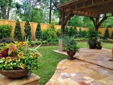Lush new backyard landscaping includes japanese yews, pistachio trees. Houzz Spring Landscaping Trends Study | Small backyard ...