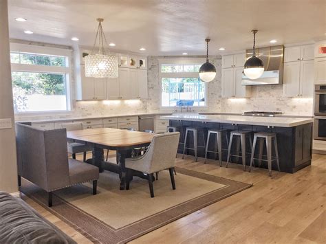 Transitional kitchen cabinets are often painted wood, and white is a favorite finish, along with other pale neutrals like beige and gray. Classic farmhouse design. White shaker cabinets, marble ...