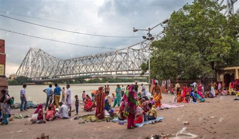 Pilgrims At Ganges Riverbank Near Howrah Bridge Kolkata India Stock Photo