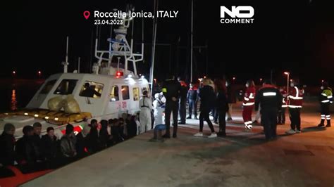 Watch More Than A Hundred People Rescued From Small Boats Off Italy