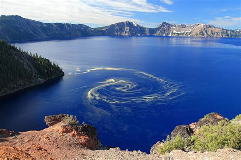 The rift zone is widening at a rate of about 1 inch (2.5 centimeters) per year. Giant swirl of pollen at Crater Lake National Park ...