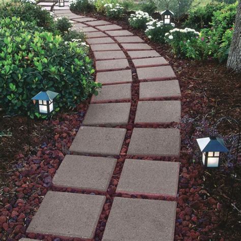 Use edging to define your concrete paver walkway. How to Make a Stepping Stone Walkway | Lowe's